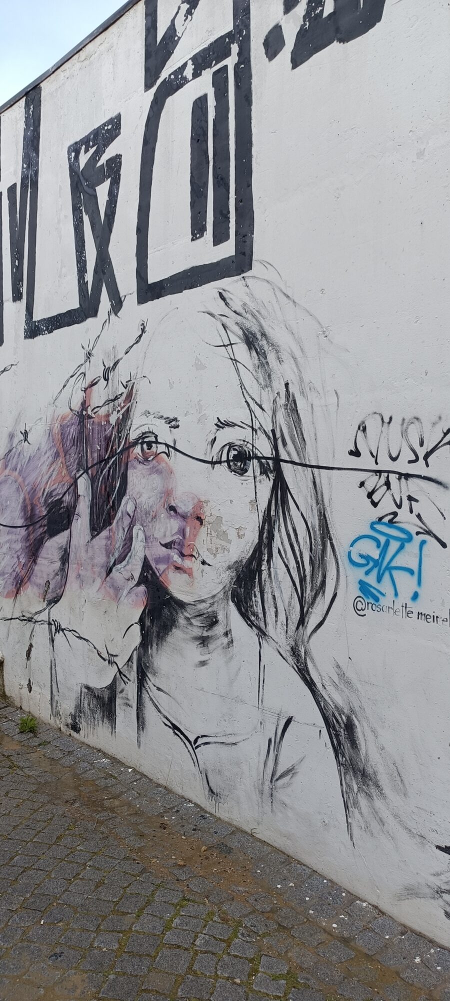 Long-Haired Face by Rosarlette Meirelles — Street art by Rosarlette Meirelles in Almada