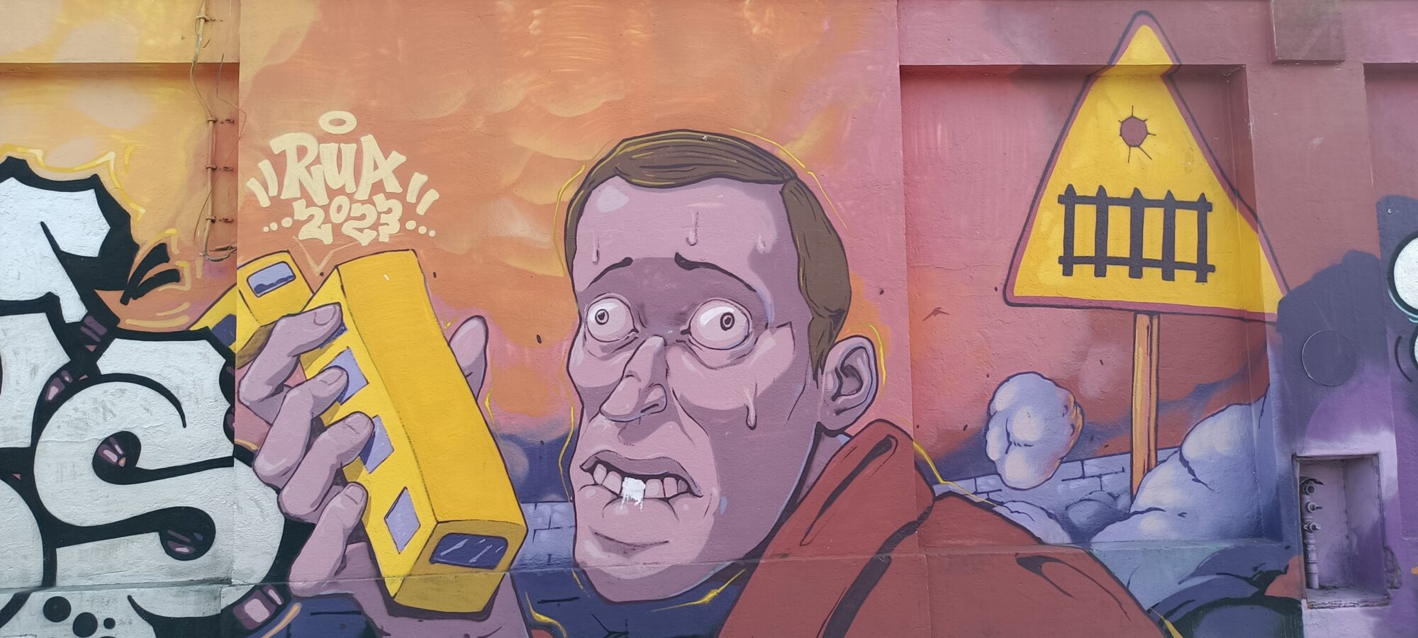 Man Holding a Tram — Street art by Colectivo RUA in Lisboa