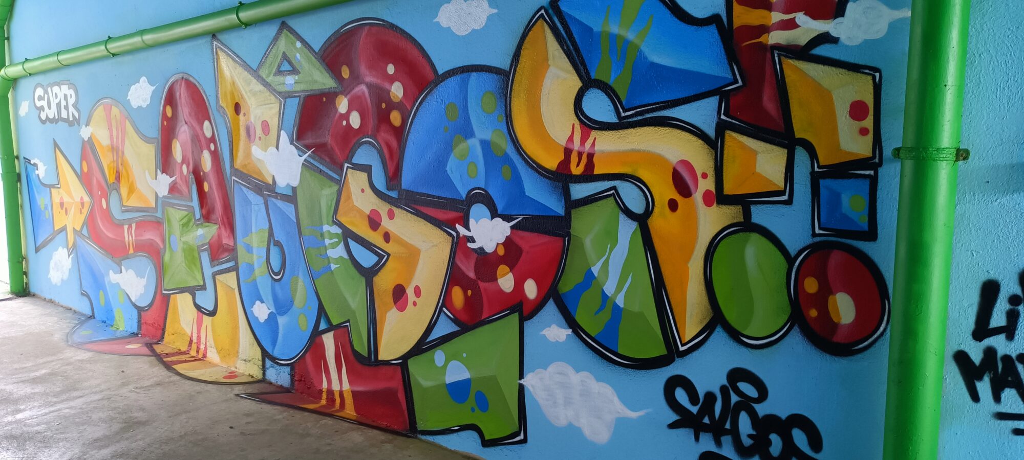 Candy lettering in the passage — Street art in Paimpol