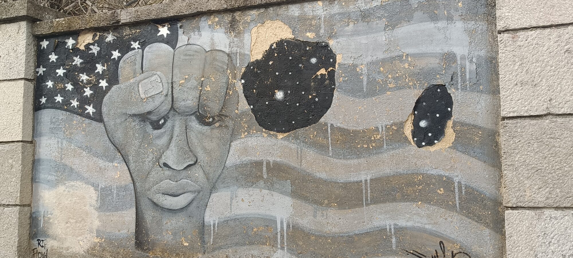 Face Within a Fist, Tribute to George Floyd — Street art in Lisboa