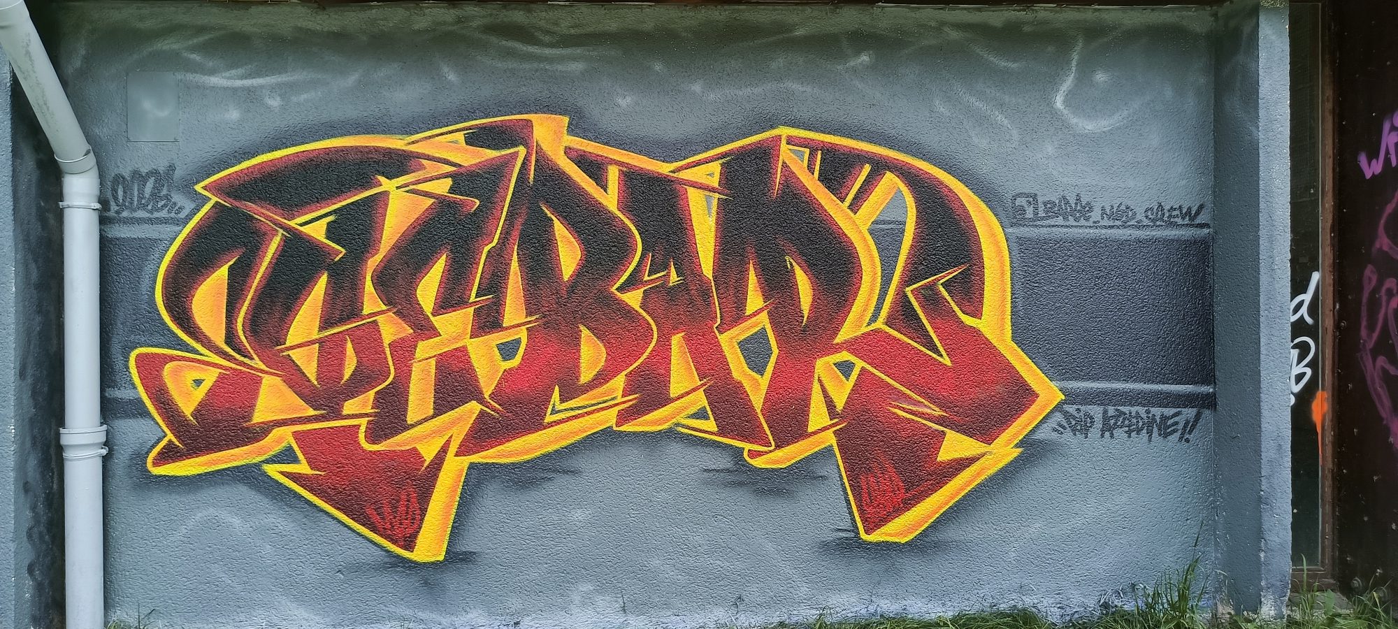 Lettrage flammé rouge et or — Street art à Sainte-Luce-sur-Loire