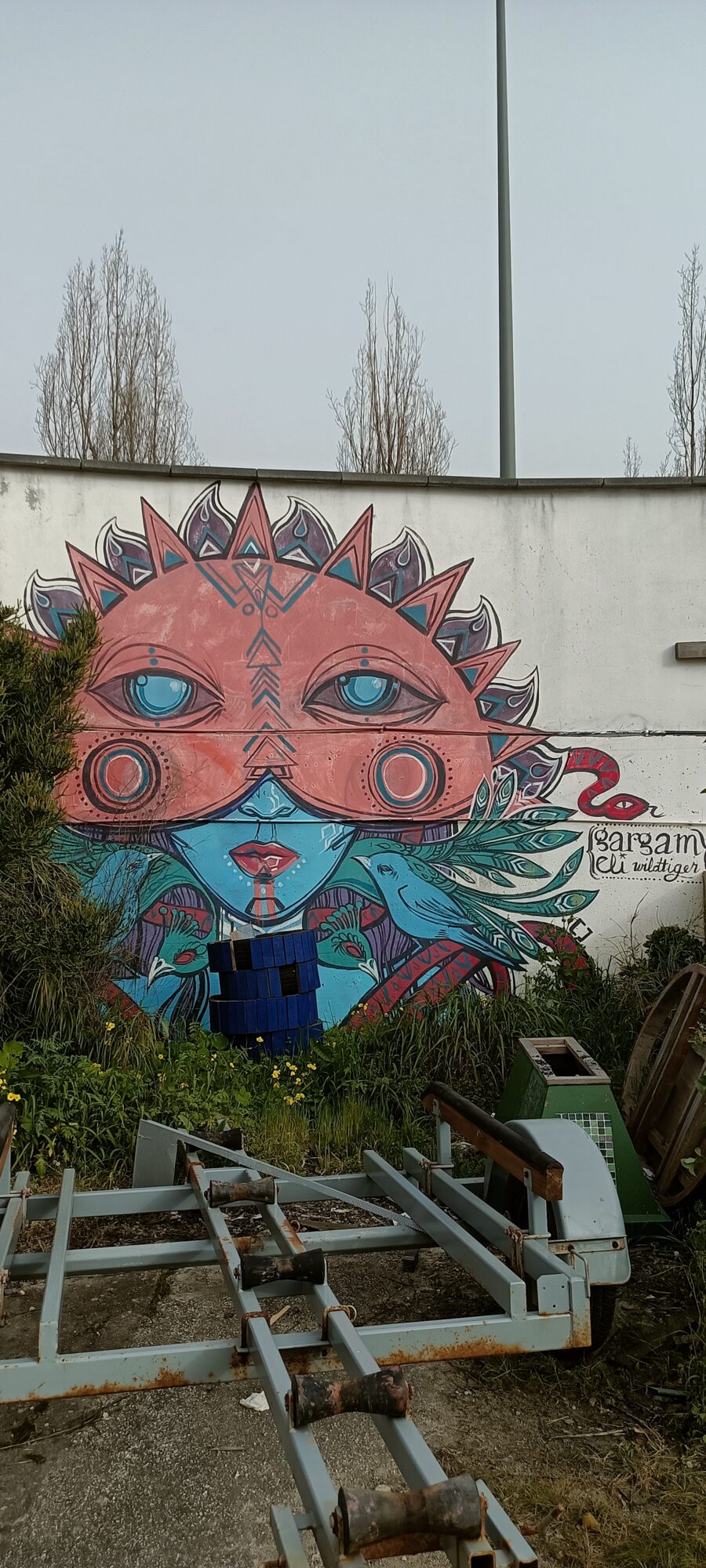 Sun Mask and Blue Face, by Sargam — Street art in Lisboa