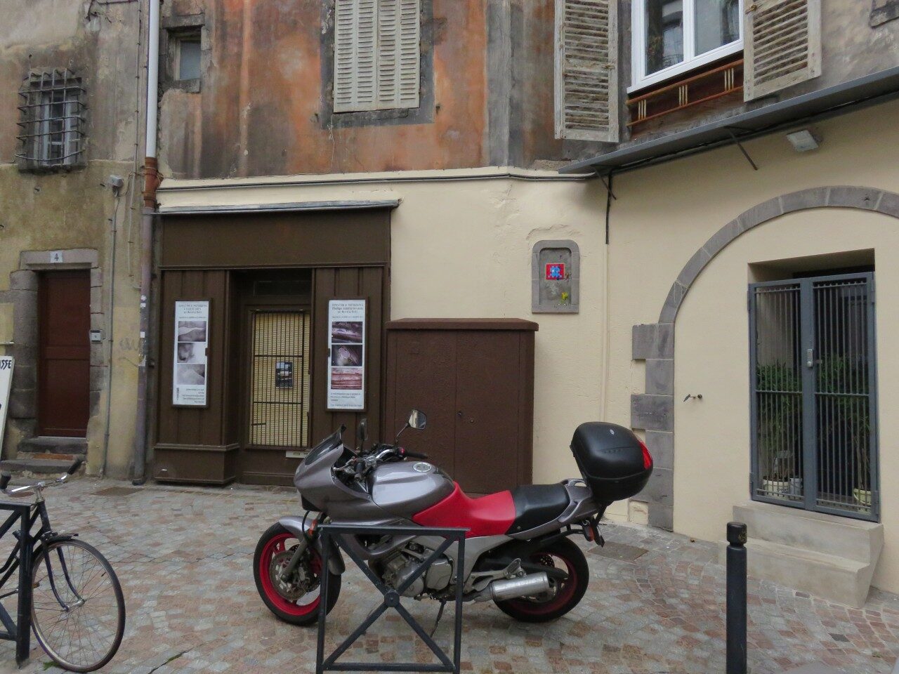 CLR_08, Space Invader on Place de la Treille — Street art by Invader in Clermont-Ferrand