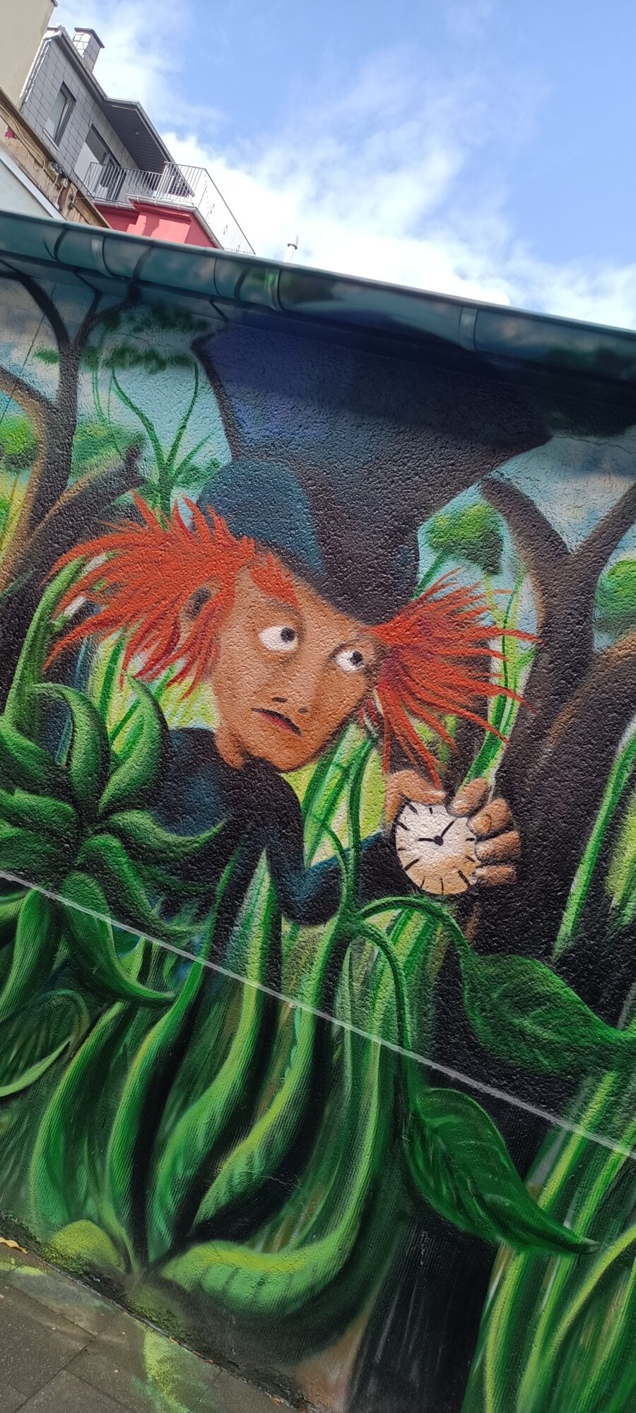 Le lutin roux à la montre de poche — Street art à Köln