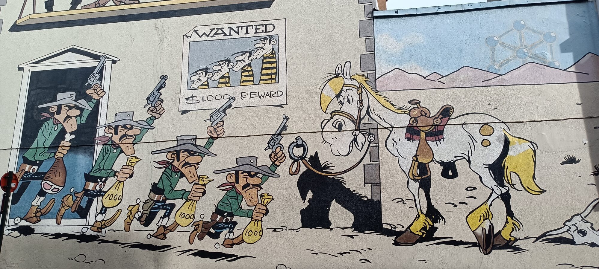 Lucky Luke et les Dalton par Morris — Street art de Morris à Bruxelles