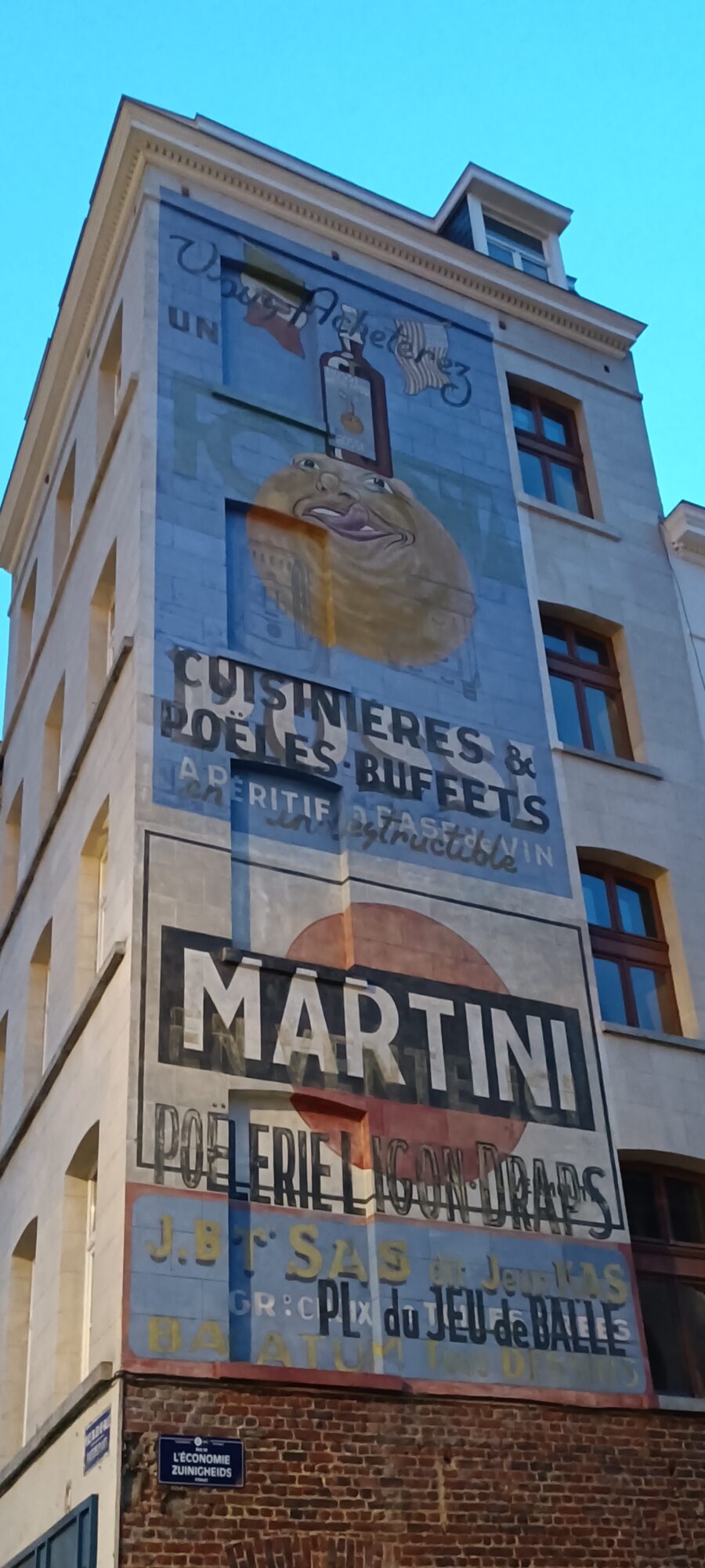 Painted Advertisements at Jeu de Balle — Street art in Bruxelles