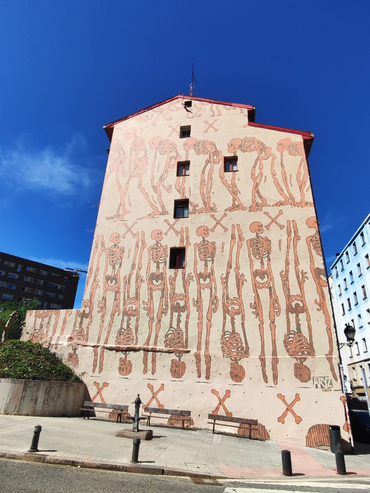 The End Justified — Street art by Aryz in Bilbao