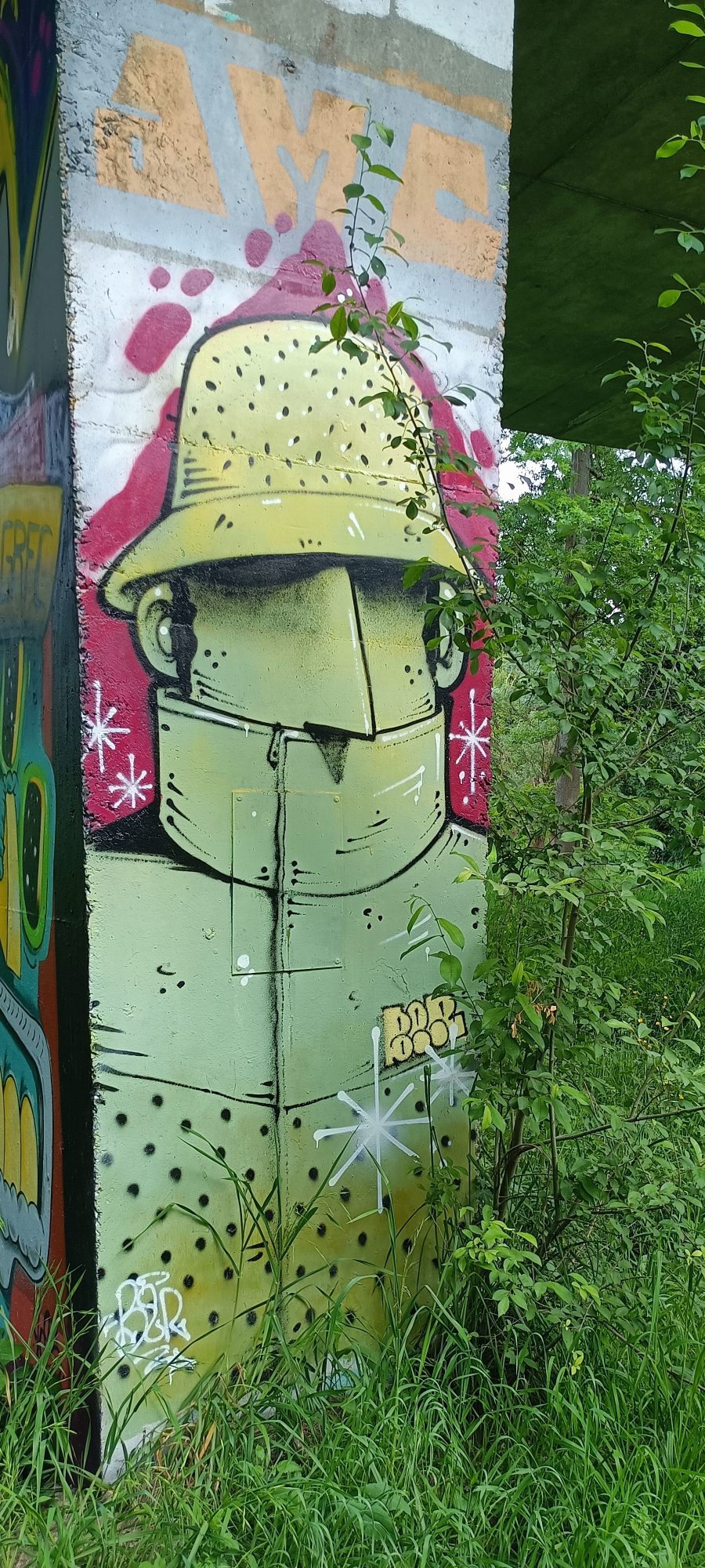 Character with a Yellow Hat — Street art in Rezé