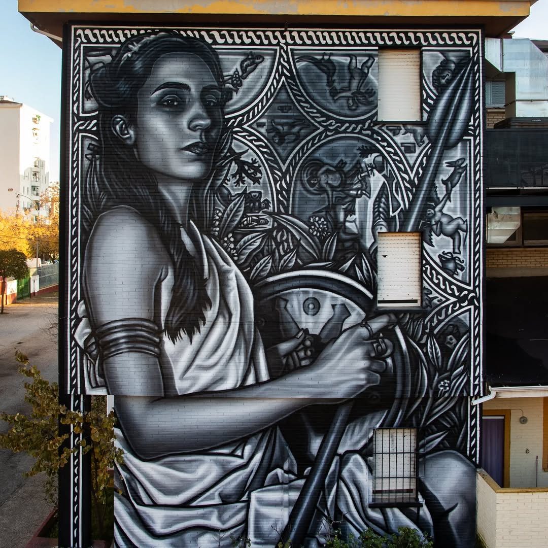 Minerva — Street art by Paola Delfín in Linares