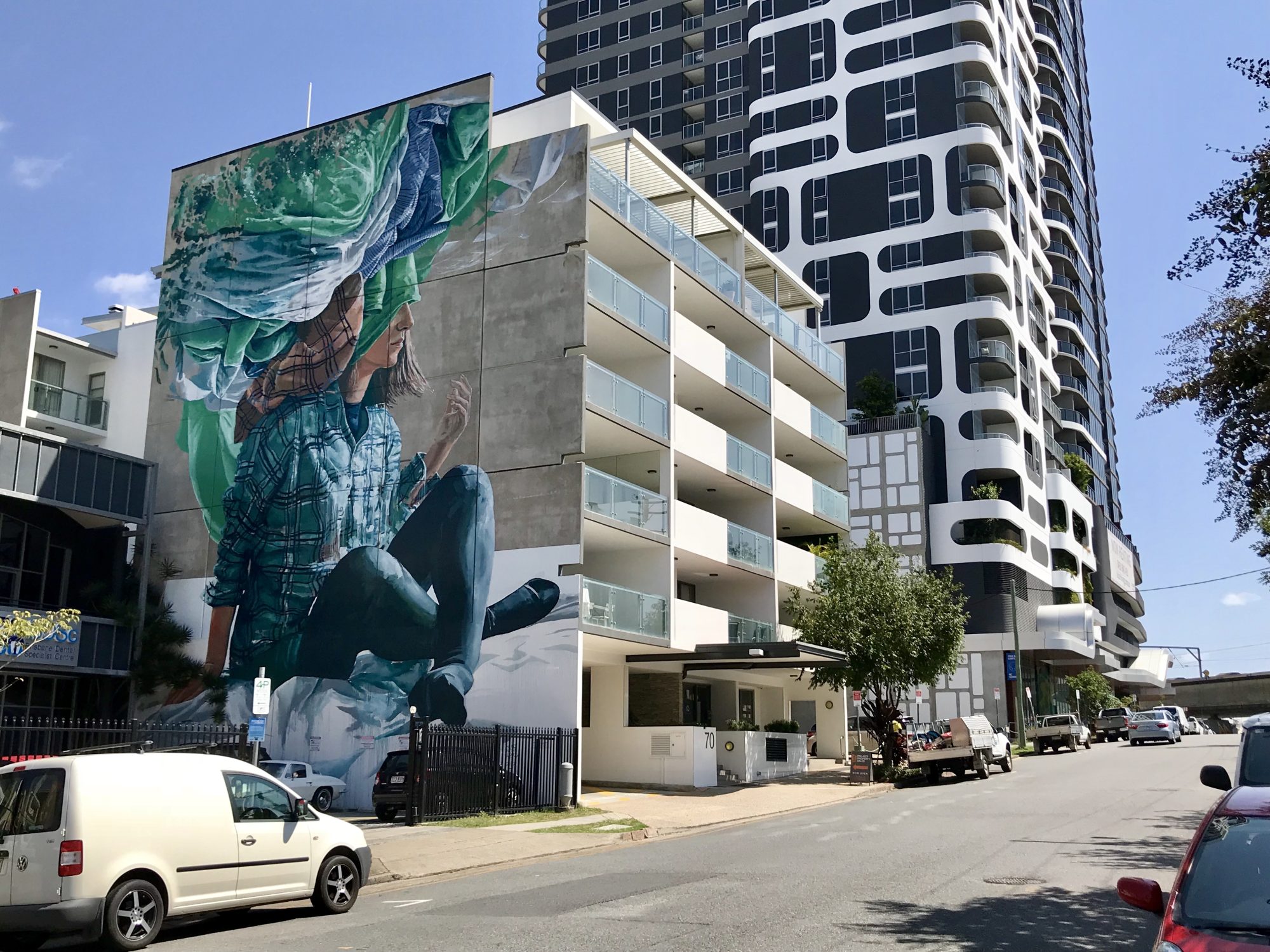 Tête dans les nuages — Street art de Fintan Magee à Brisbane
