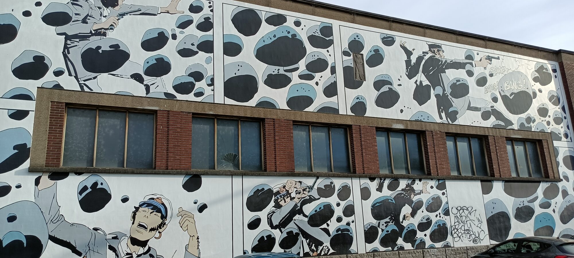 Corto Maltese, shootout on pebbles — Street art by Hugo Pratt in Bruxelles