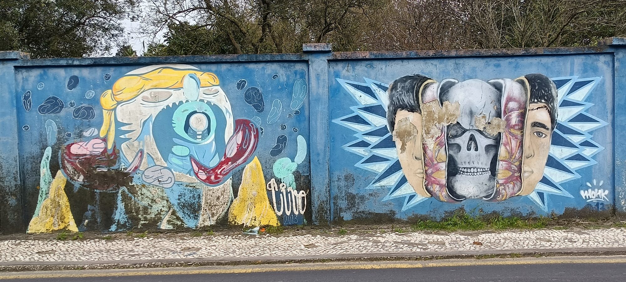 Créature à l'œil unique et tête tripartite — Street art à Lisboa