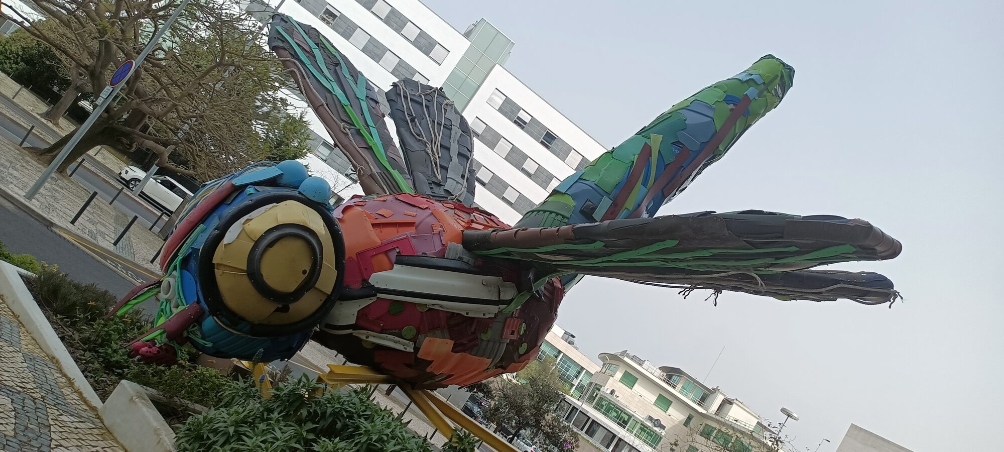 Monumental Insect in Recycled Plastic — Street art by Bordalo II in Lisboa