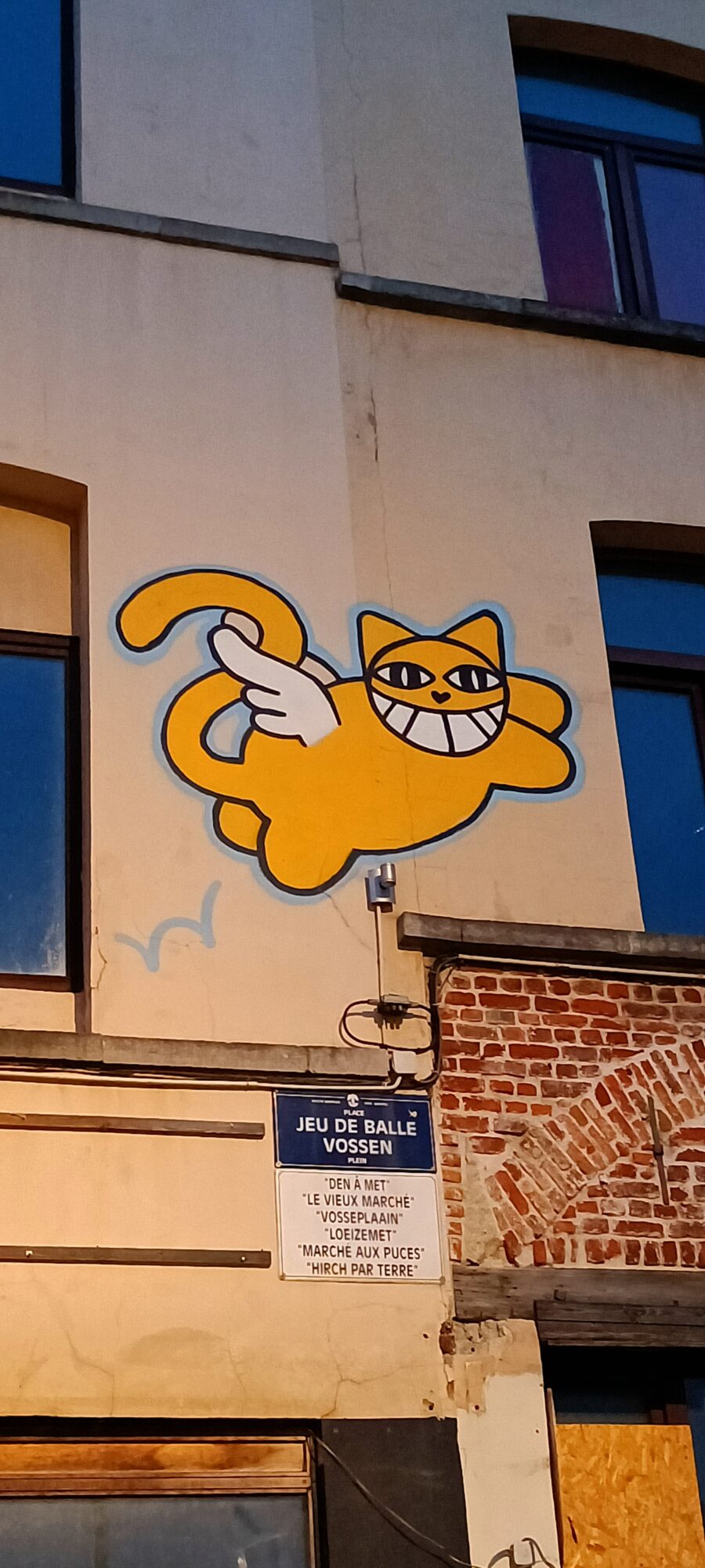 The Winged Cat of Jeu de Balle by M. Chat — Street art by M. Chat in Bruxelles