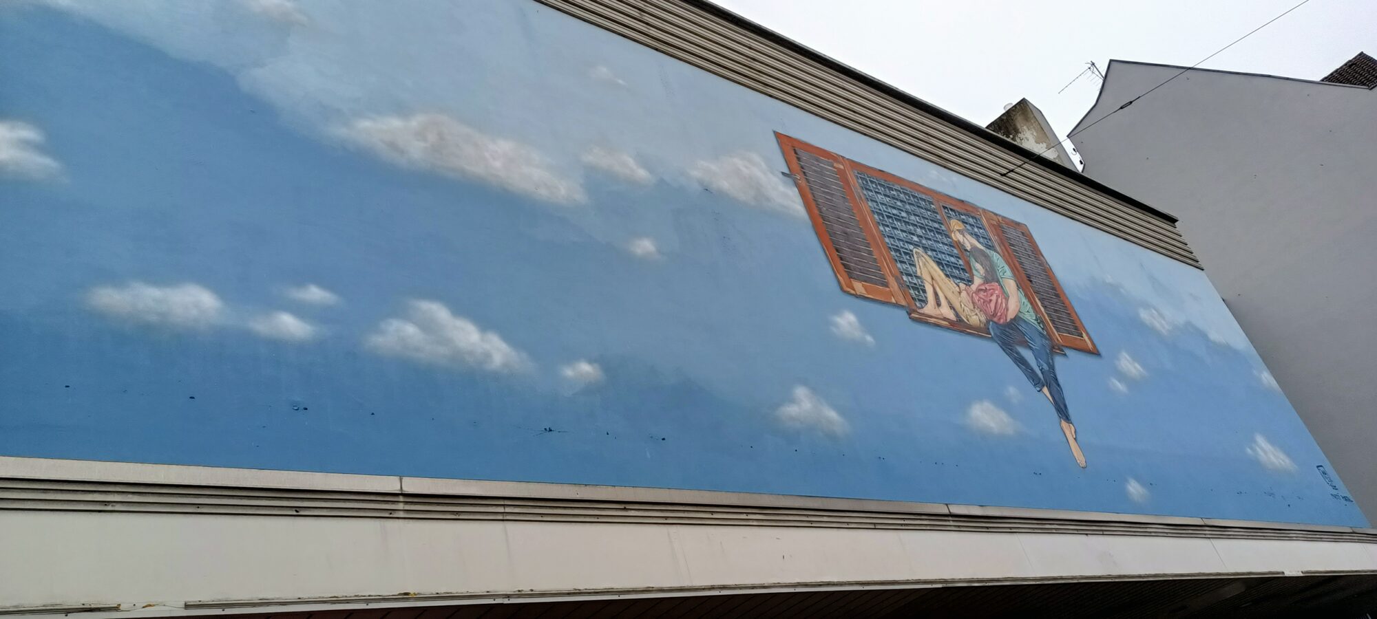 Trompe-l'oeil window on a blue sky — Street art in Düsseldorf