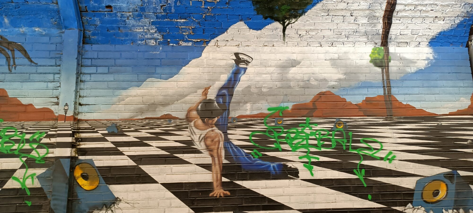 Breakdancer on the checkerboard — Street art by Goodlack Art in Köln