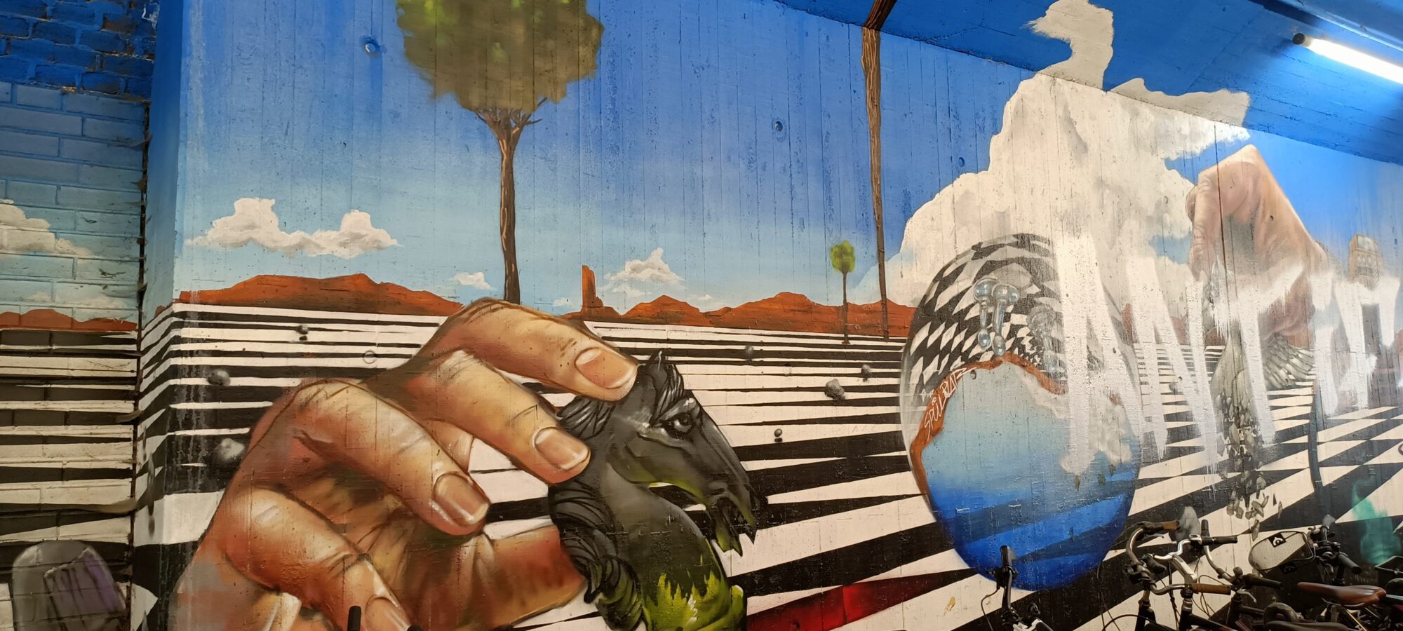 The hand and the horse's head — Street art by Goodlack Art in Köln