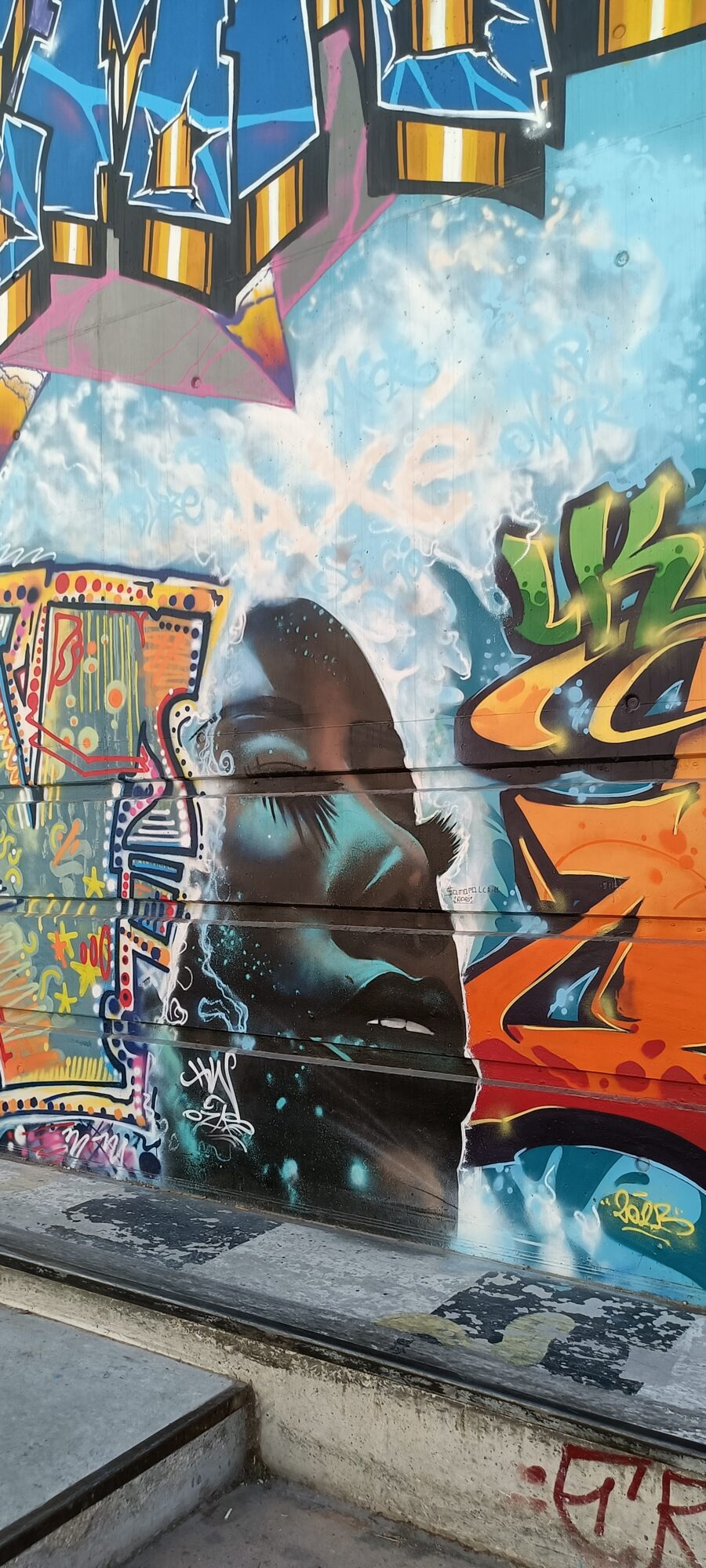 Closed-Eyed Face in the Smoke — Street art in Marseille