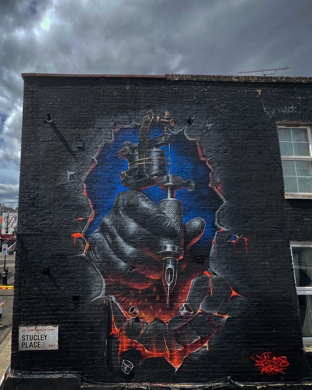 Hand Holding a Tattoo Machine — Street art by Hard Styler in London