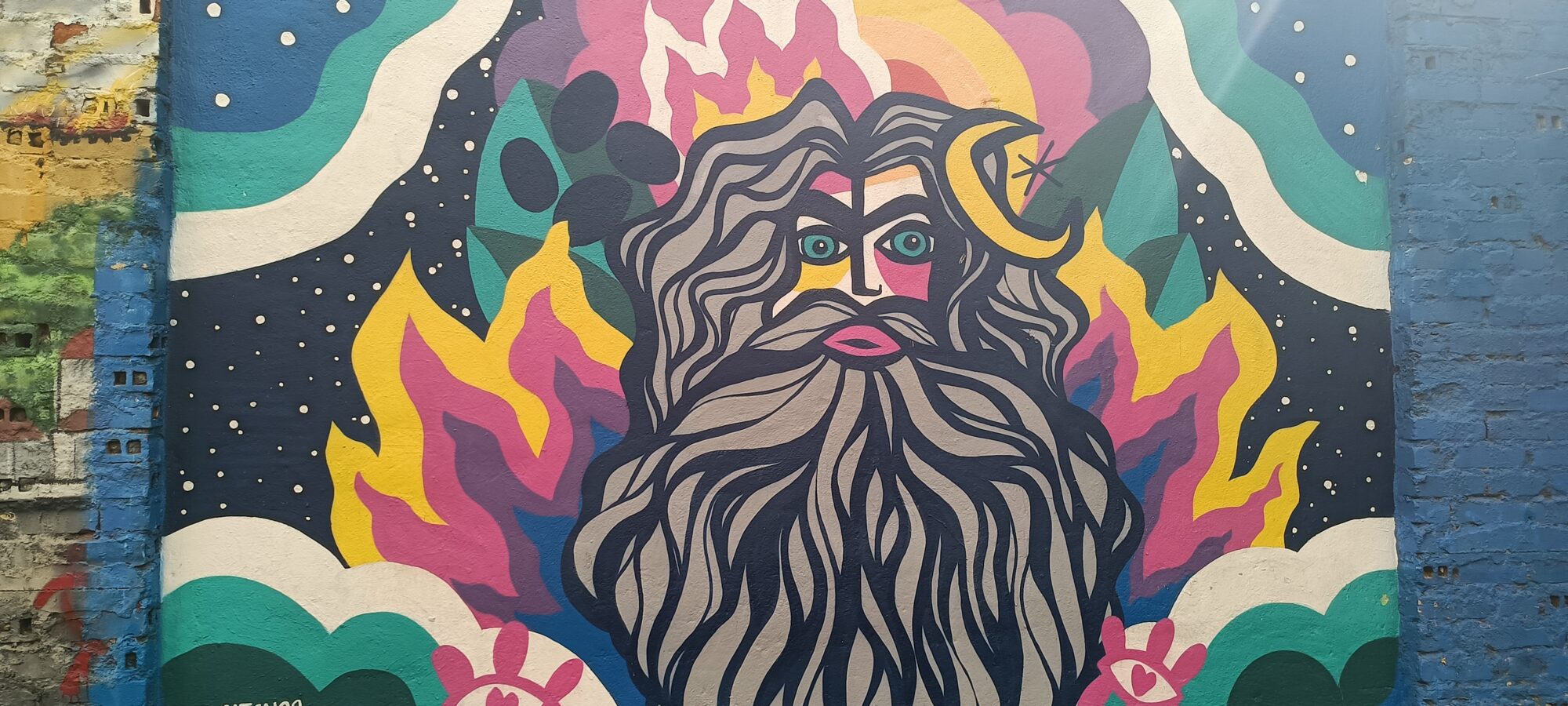 Bearded Face with a Crescent Moon — Street art in Lisboa