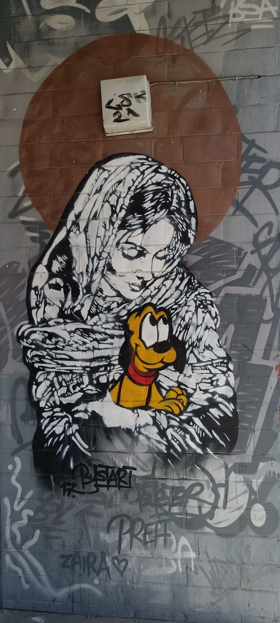 Embrace with Yellow Pluto — Street art by BustArt in Berlin