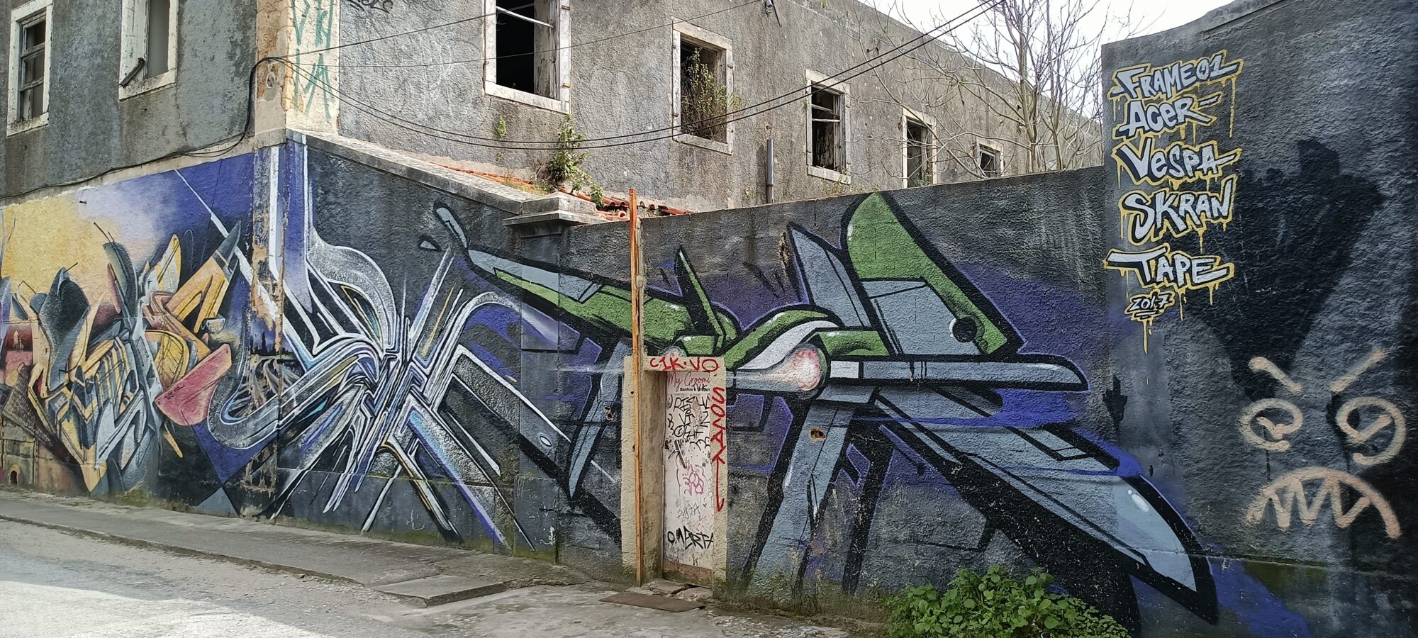 Wall by the Frameoz Acer Vespa Skran Tape Crew — Street art in Almada