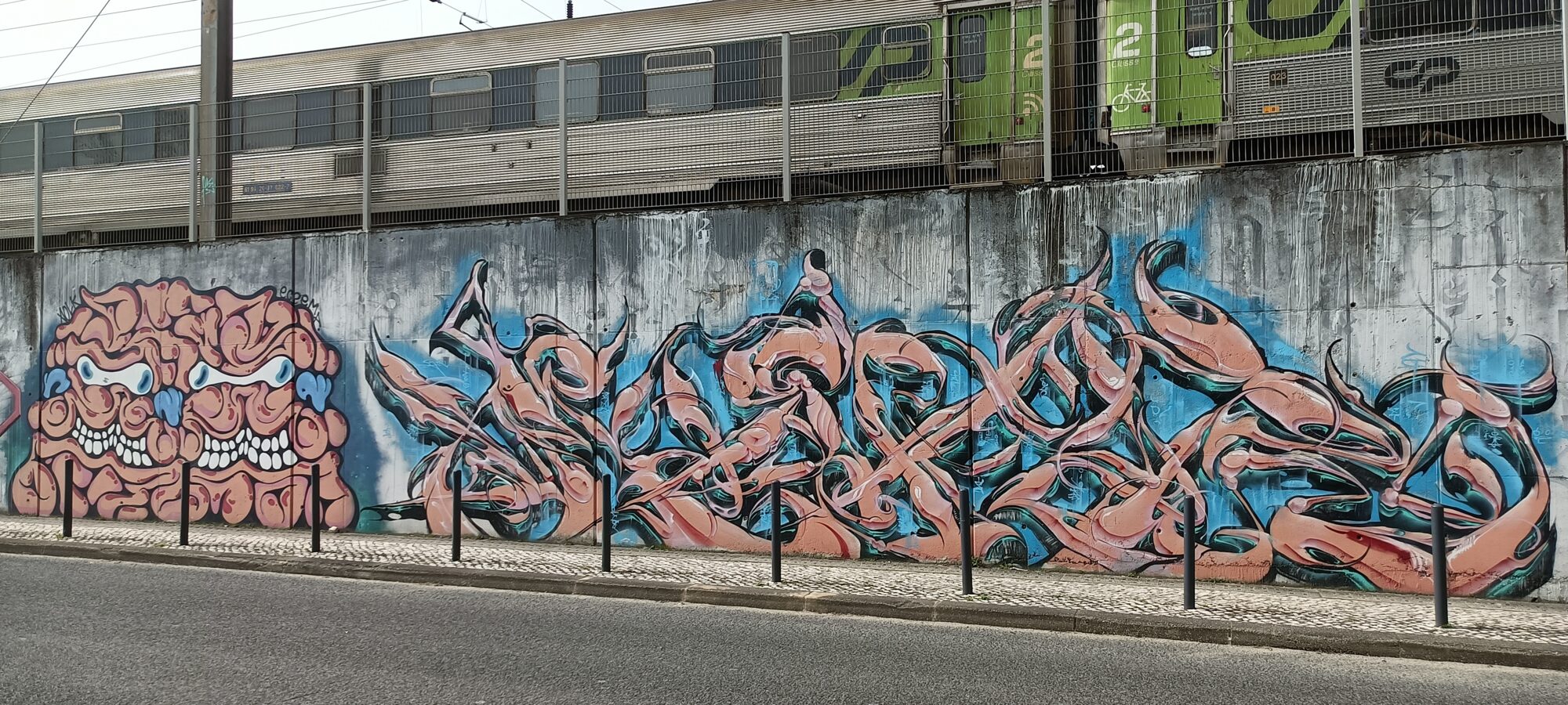 Twin Brain-Face and Pink Tentacles — Street art in Lisboa