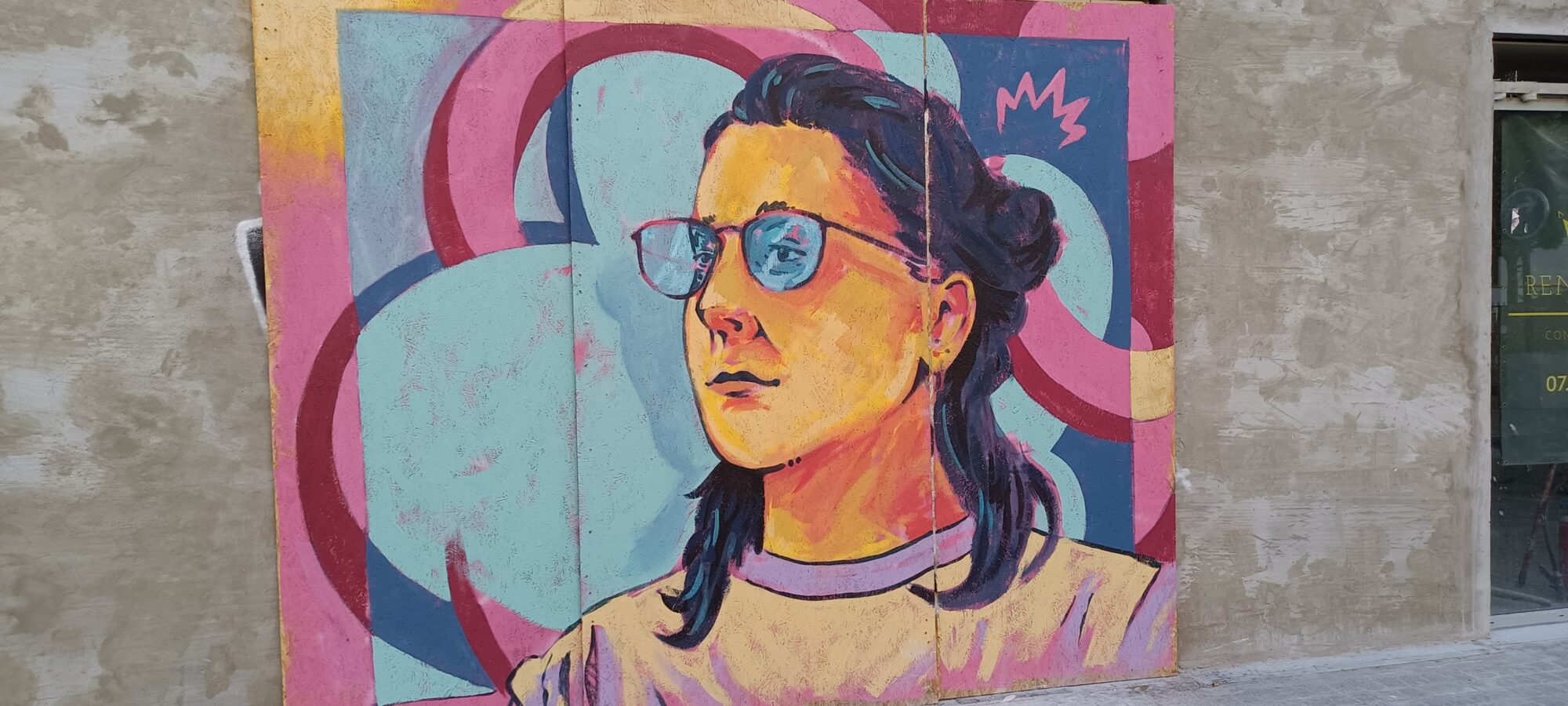 Woman with Glasses on Wooden Panels — Street art in Nantes