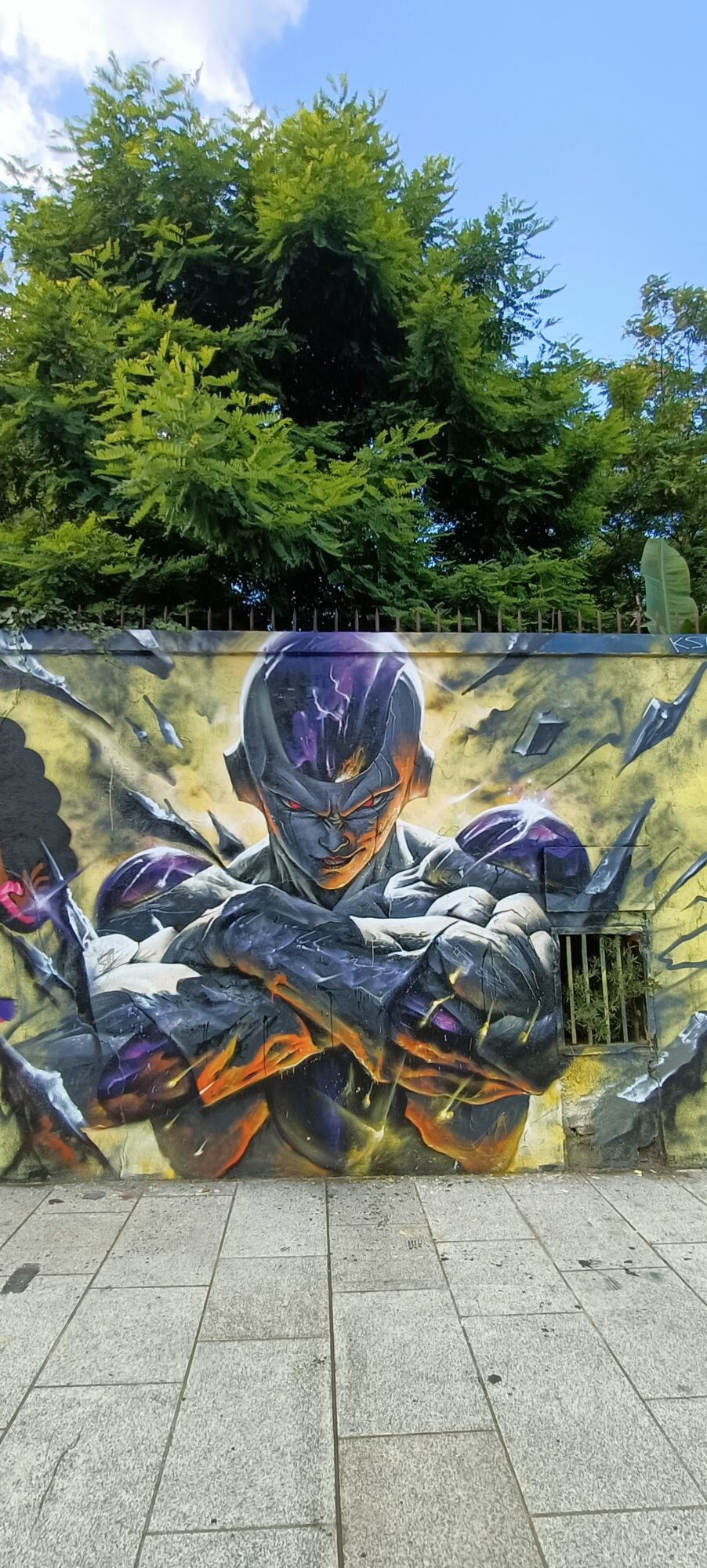 Frieza with Folded Arms on a Yellow Wall — Street art in Nantes