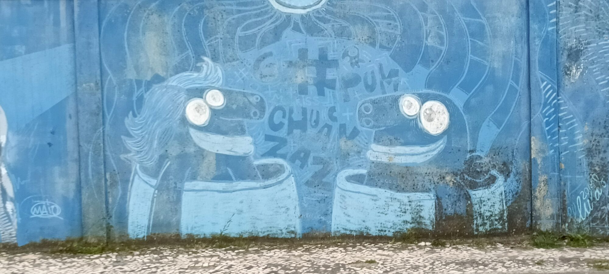 Blue horses face to face — Street art in Lisboa