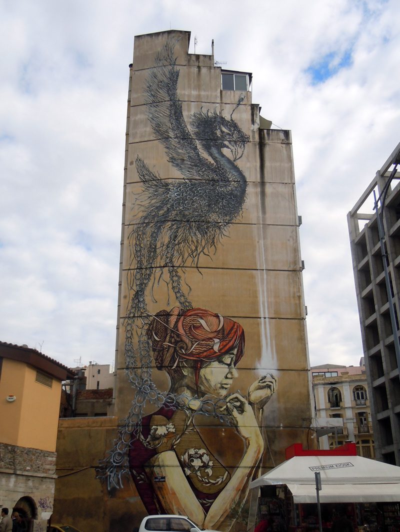 The Girl and the Phoenix — Street art by DALeast in Thessaloniki