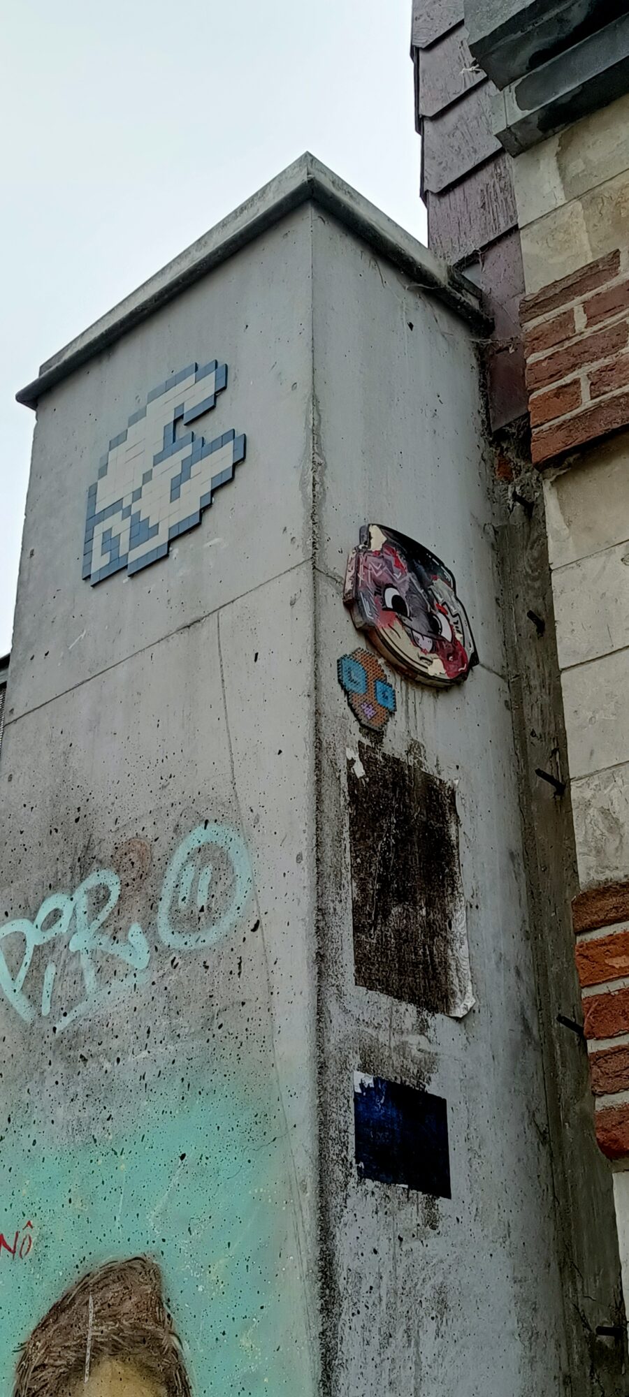 Pixelated Wave in Blue Tiles — Street art by Invader, Fast Freak in Bruxelles