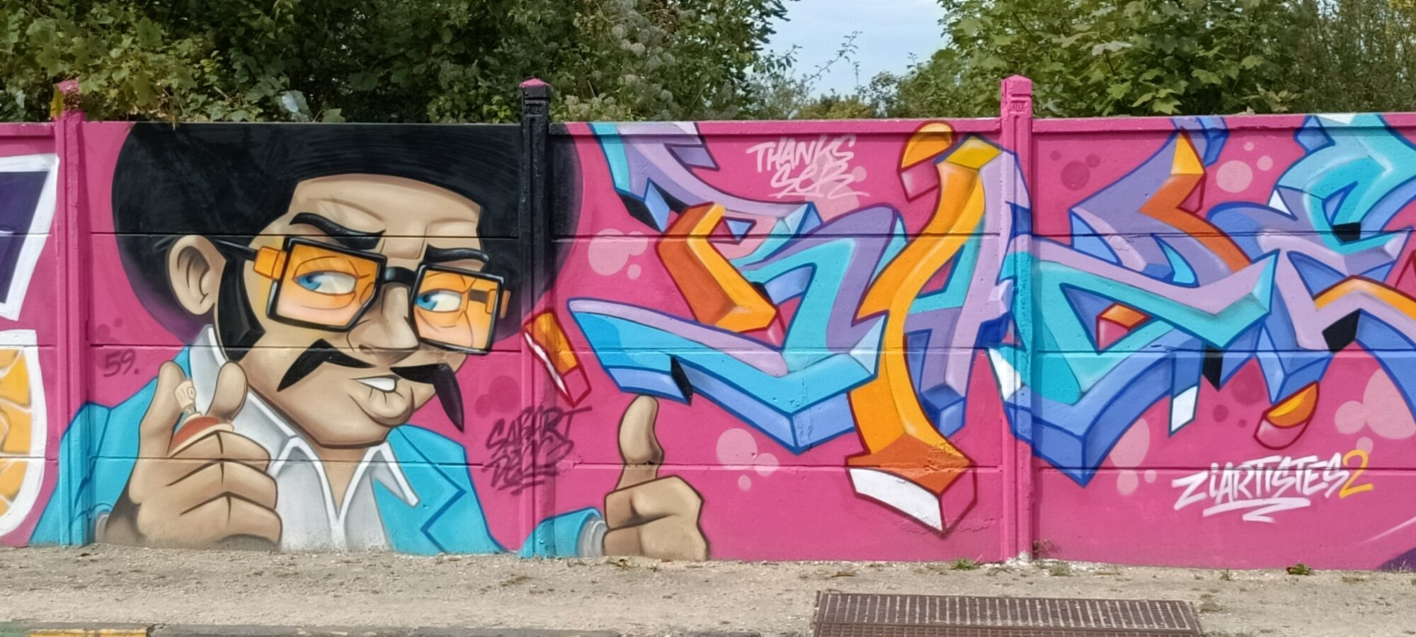 Man in a Hat and Shak Lettering — Street art in Reims