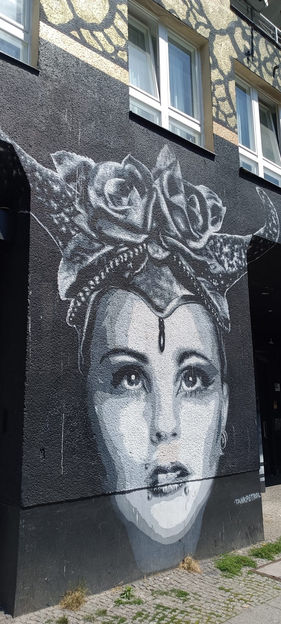 Woman with the Rose Headdress — Street art in Berlin