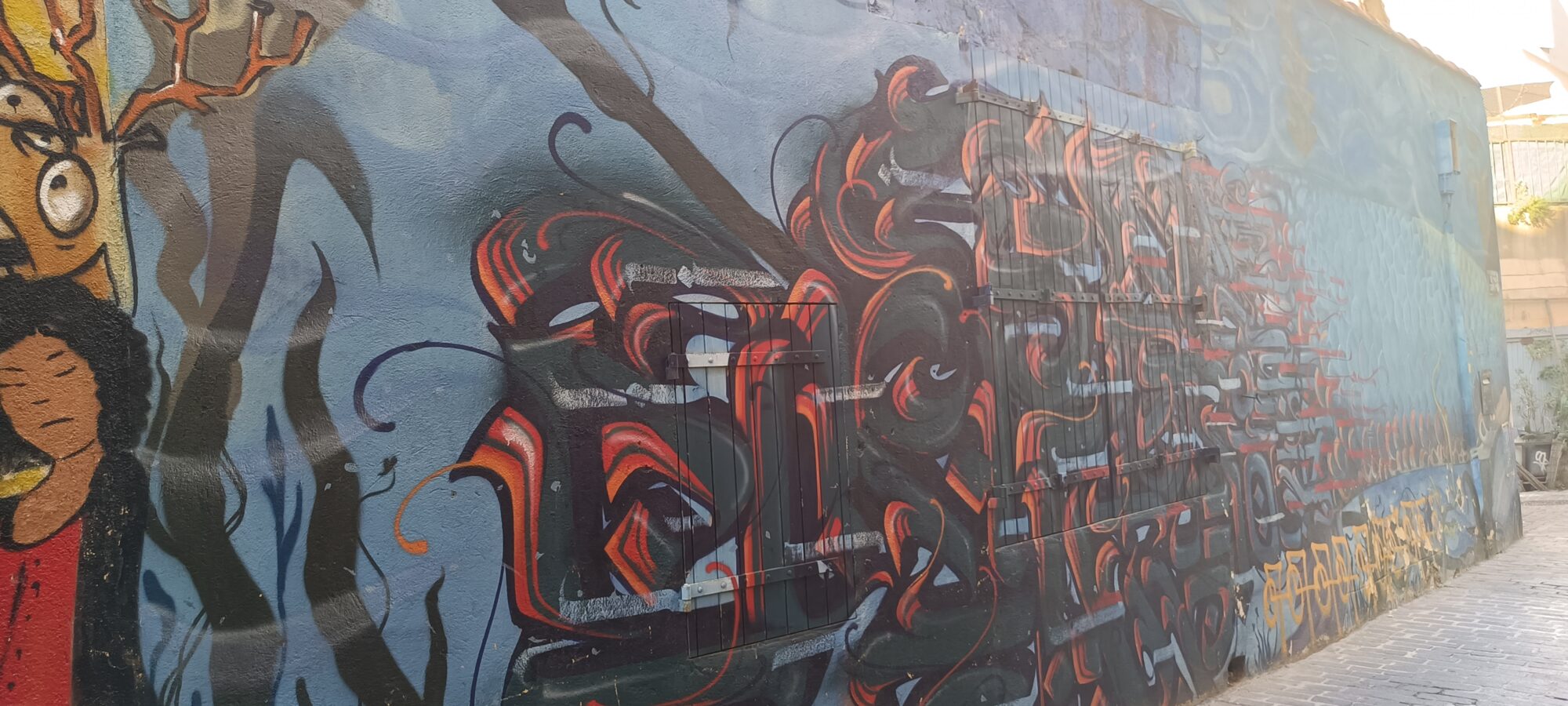 Red and Black Wildstyle in Flames — Street art in Marseille