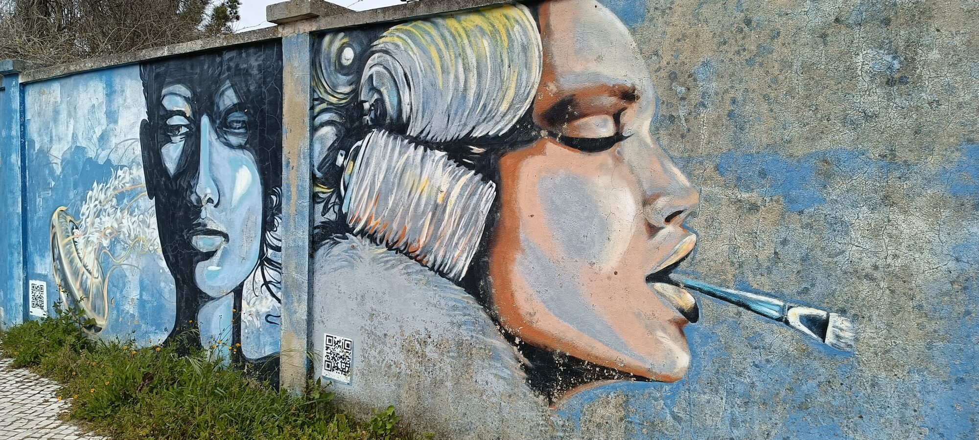 Three faces and a brush between the teeth — Street art in Lisboa