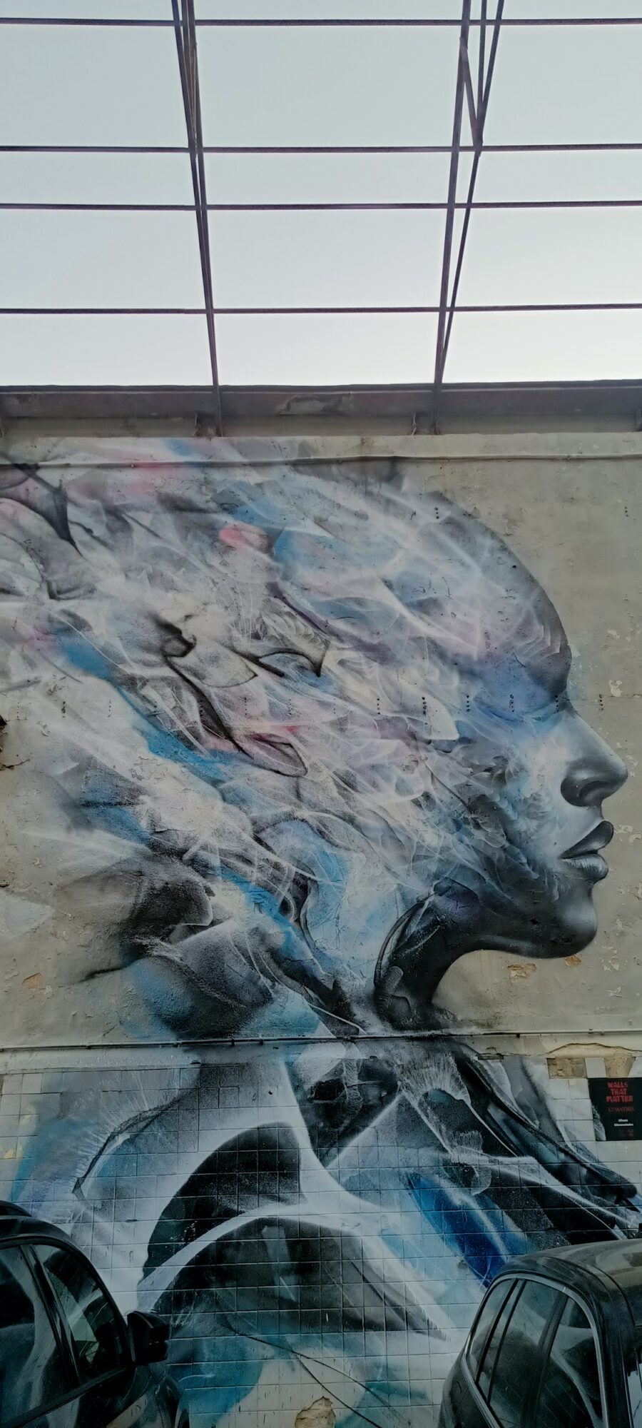 Born of Rage, Crowned in Light — Street art by L7M in Lisboa