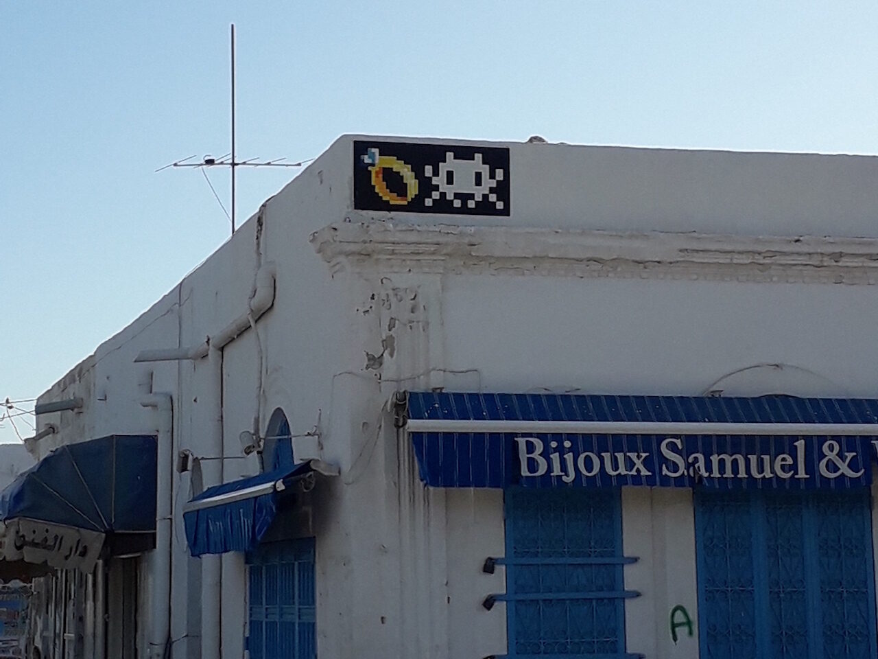 DJBA_08, Space Invader on Taourit — Street art by Invader in Houmt Souk