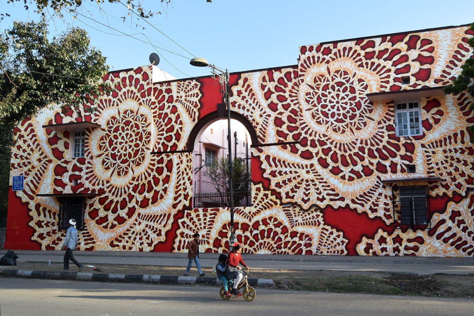 Red Lace and Rangoli — Street art by NeSpoon in Delhi