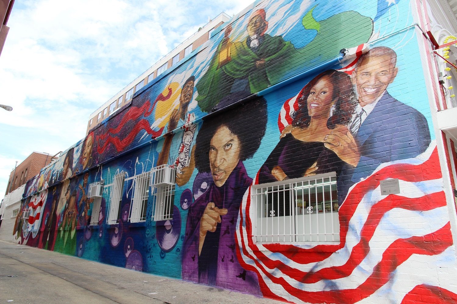 The Torch — Street art by Aniekan Udofia in Washington