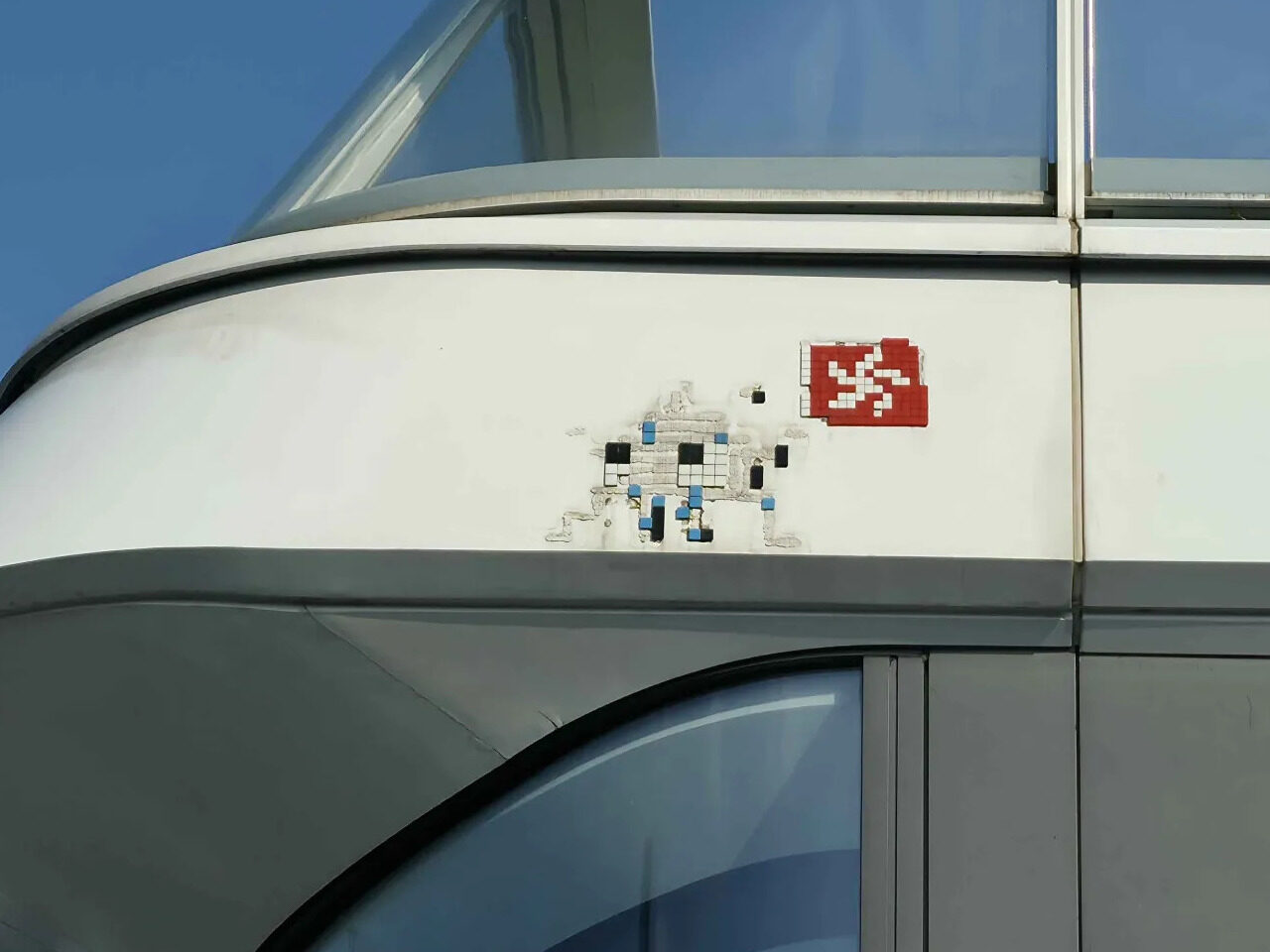 HK_108, Space Invader on Tsim Sha Tsui — Street art by Invader in Hong Kong