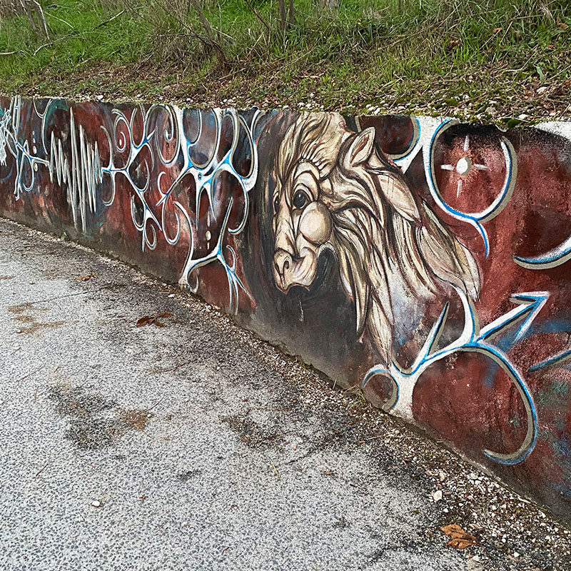 The Chimera and the Lion — Street art by Maria Angelica Mazzulli in Aielli Stazione