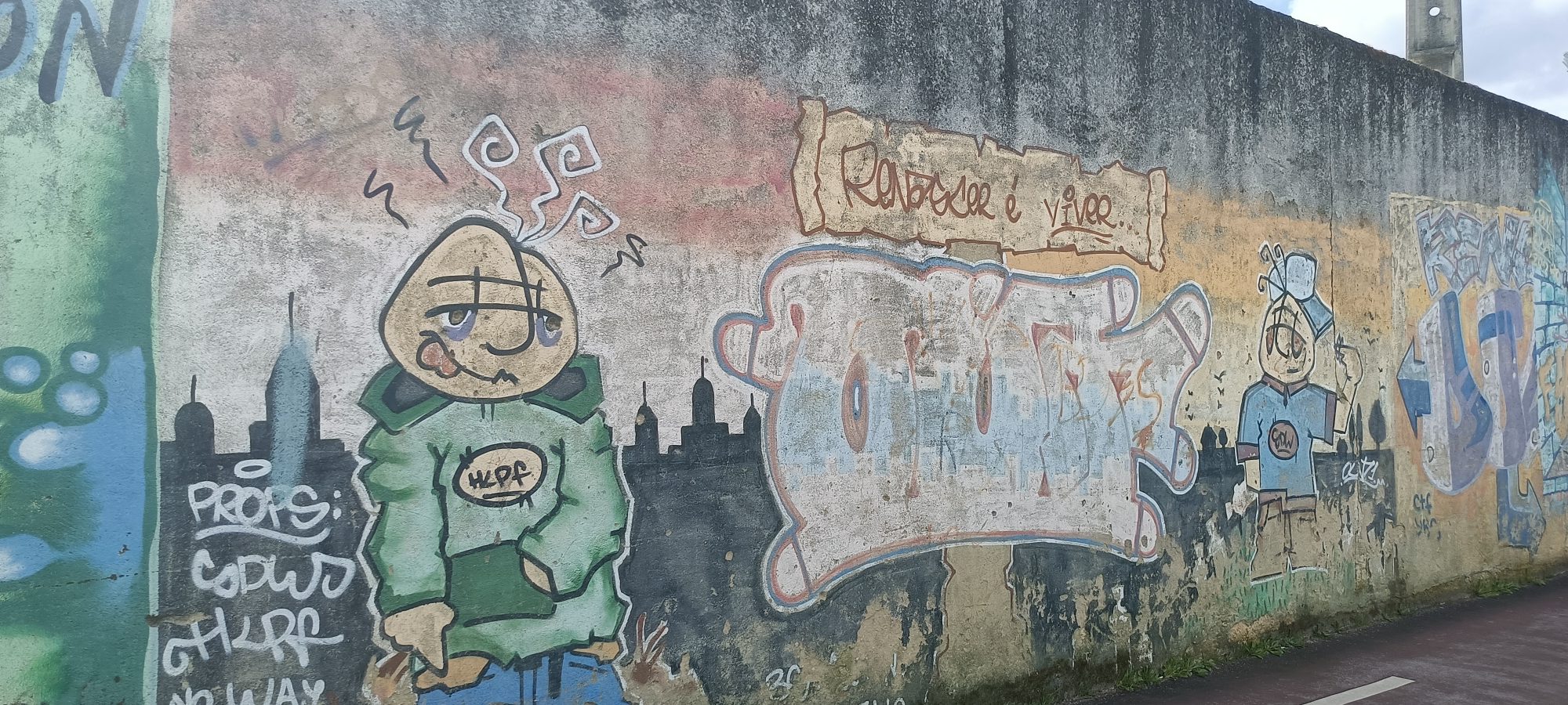 Renascer é Viver — Personnage au Hoodie — Street art à Lisbon