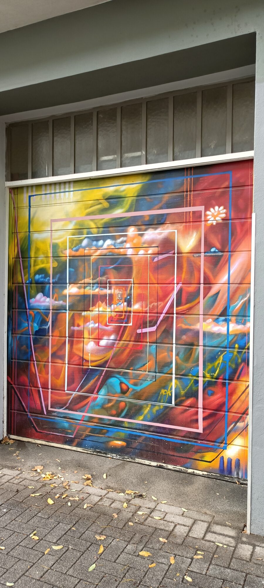 Porte de garage aux cadres concentriques — Street art à Köln