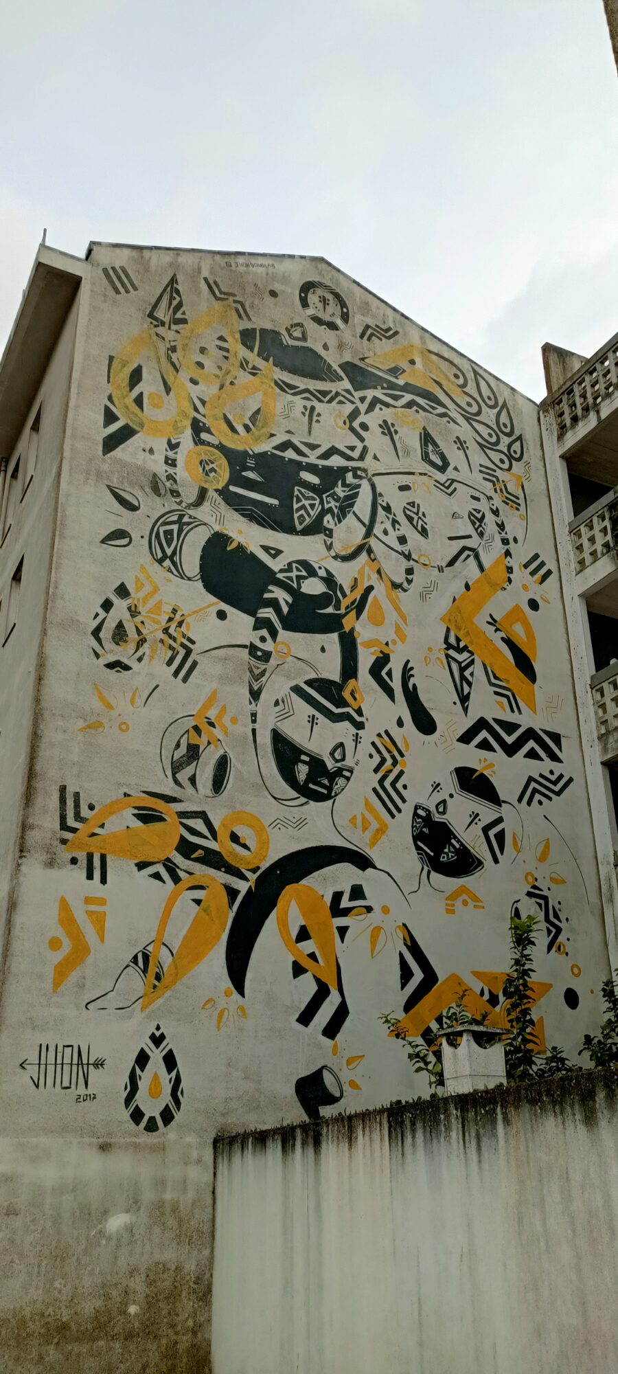 Black and Yellow Tribal Composition — Street art by Jhon Douglas in Lisboa