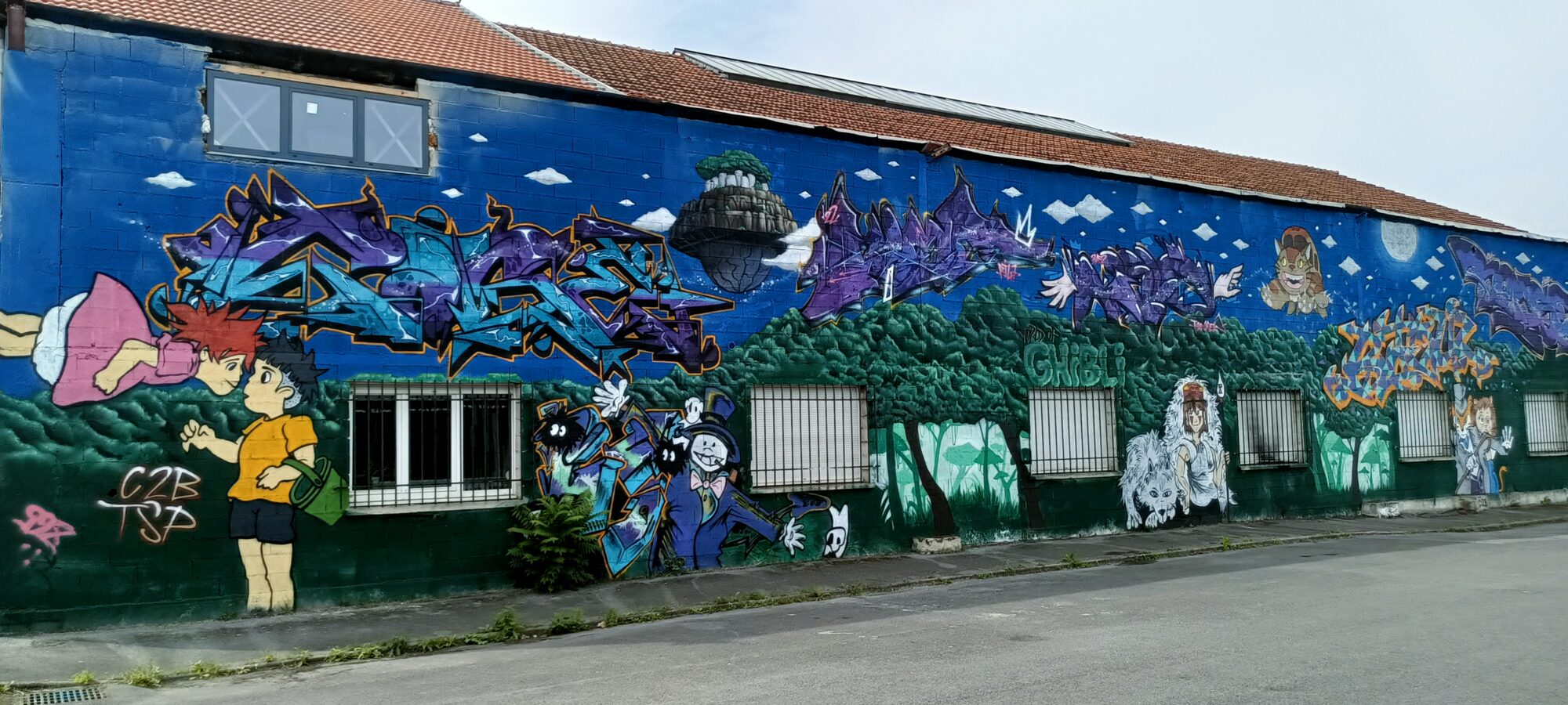 Ghibli Wall in Bétheny, Wide View — Street art in Bétheny