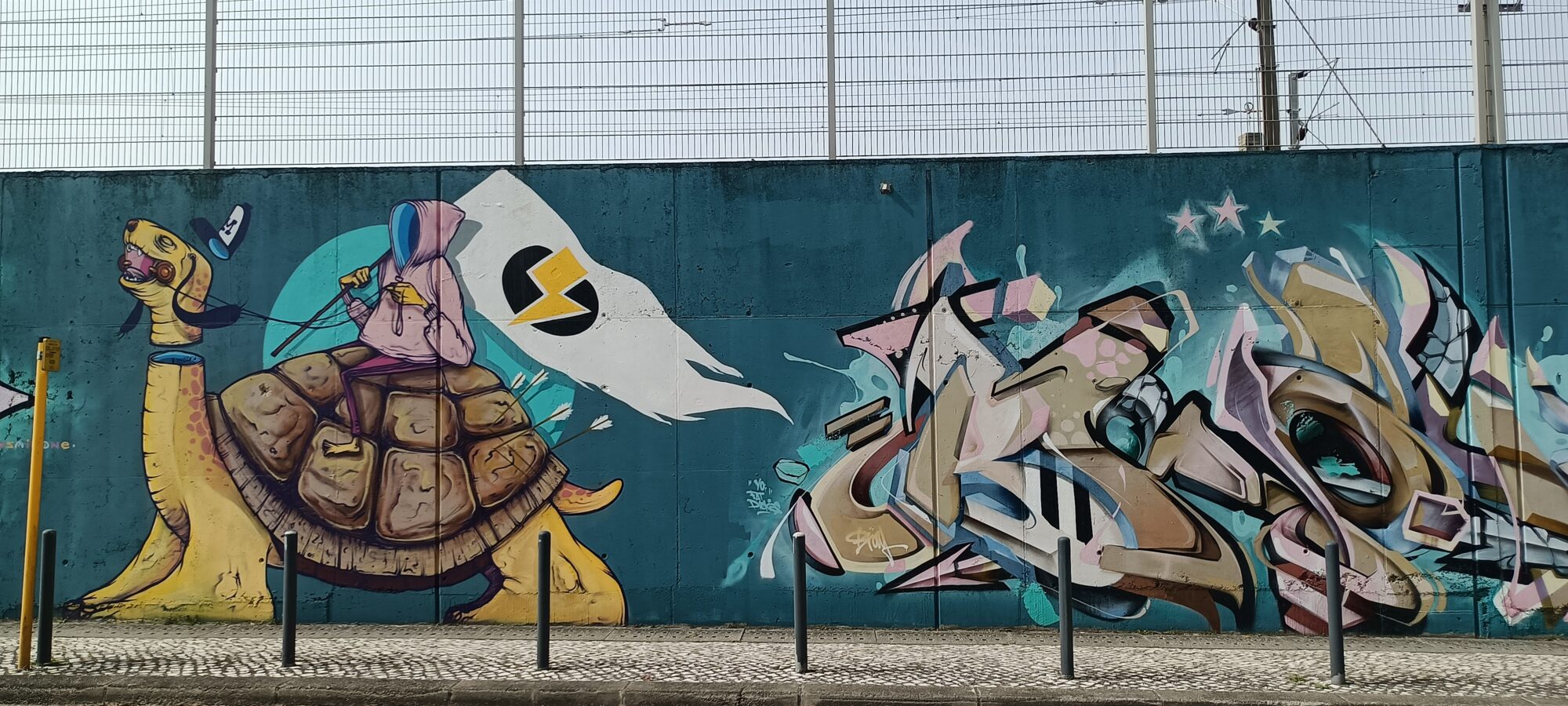 Giant Tortoise and Flag Bearer — Street art in Lisboa