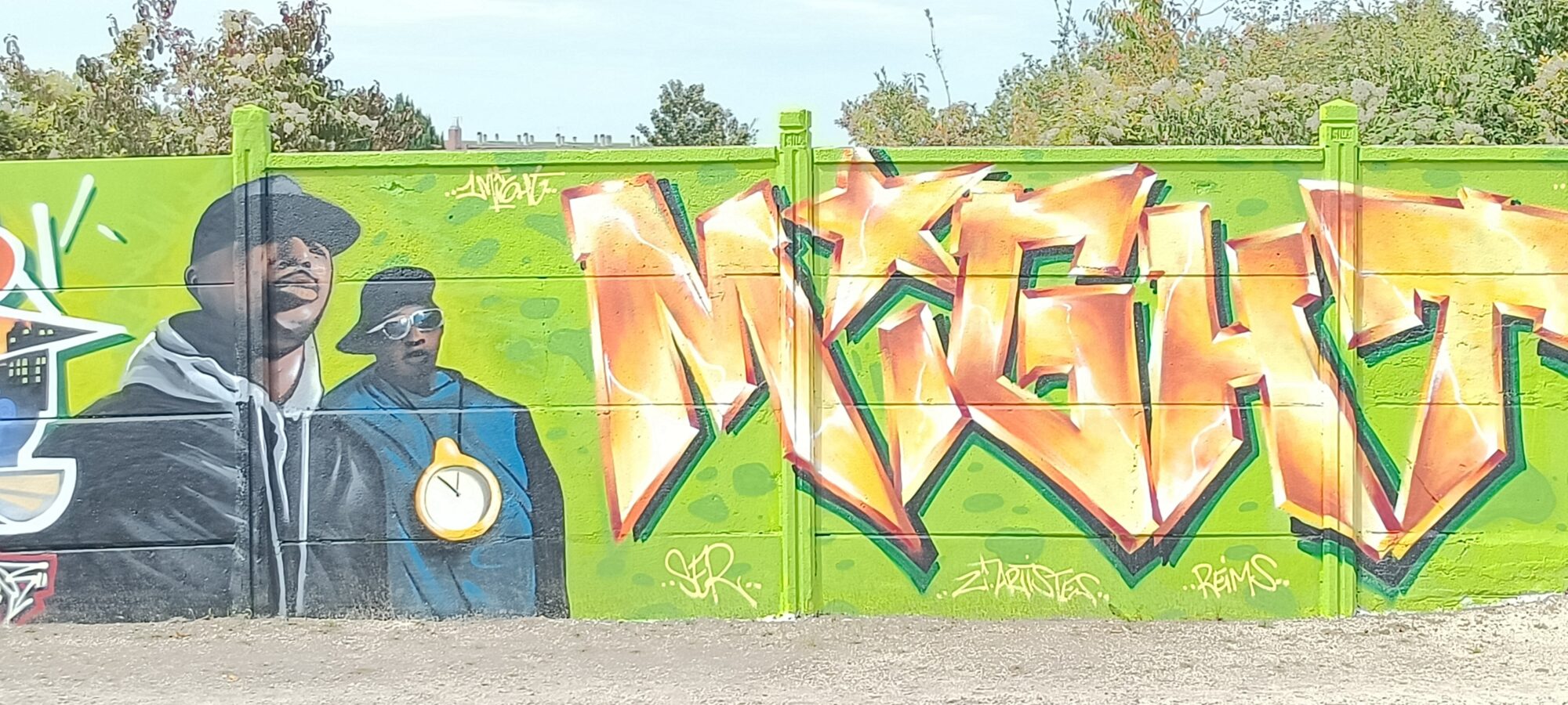 Public Enemy and Orange Lettering — Street art in Reims