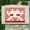 TLS_02, Space Invader on Route de Monfort — Street art by Invader in Mauvezin