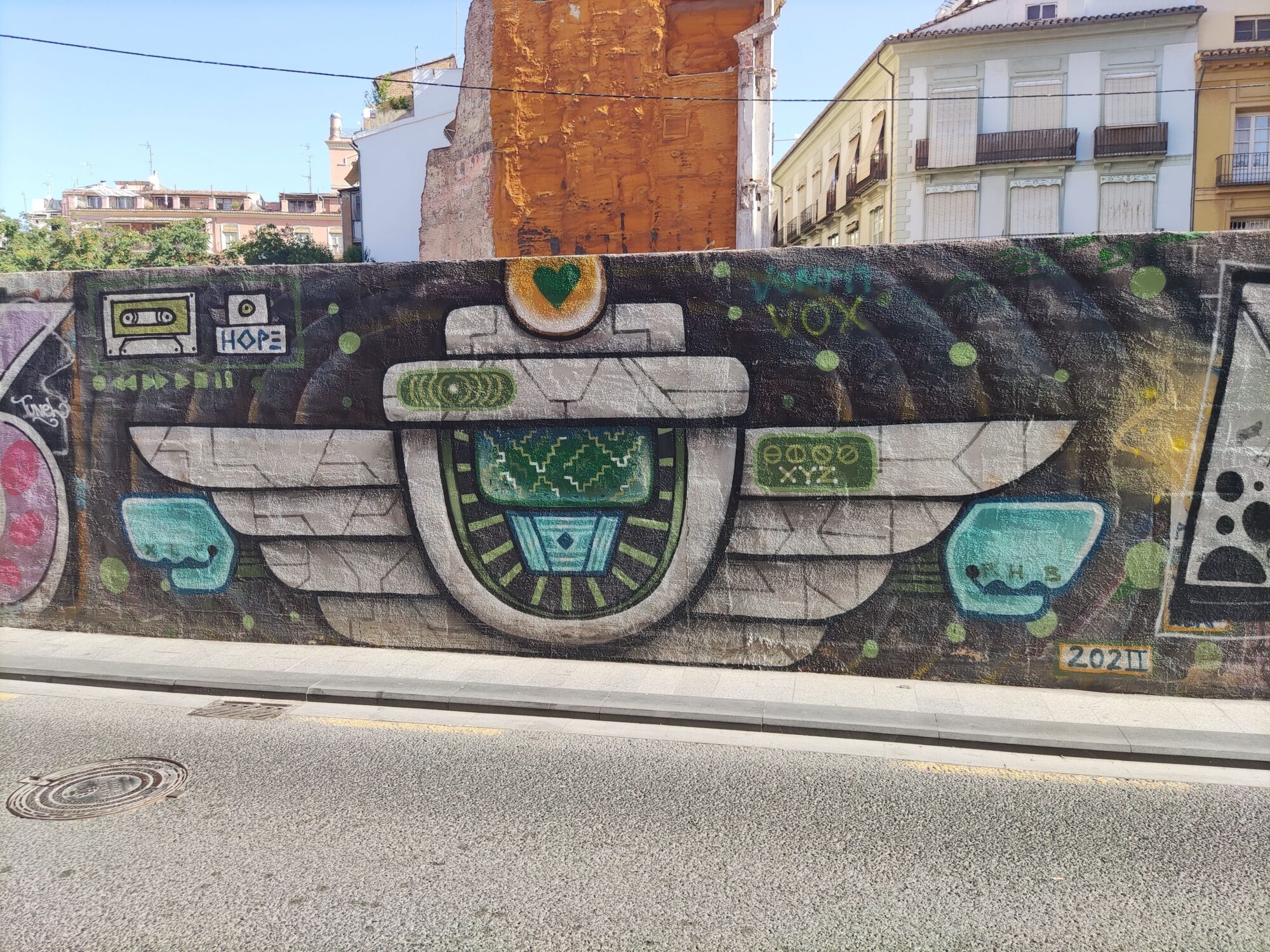 Winged Emblem with a Green Heart — Street art in València